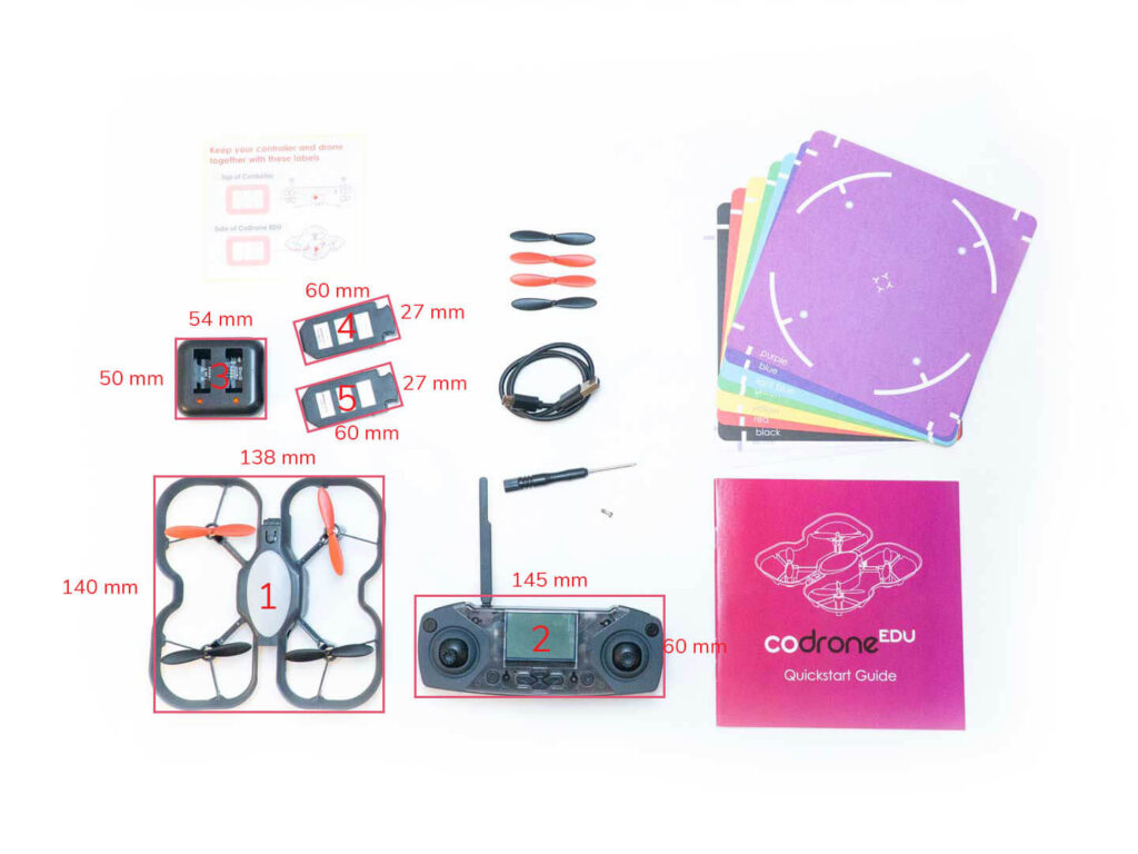 A CoDrone EDU drone next to a laptop displaying block coding software, perfect for hosting STEM competitions and teaching programming in classrooms.