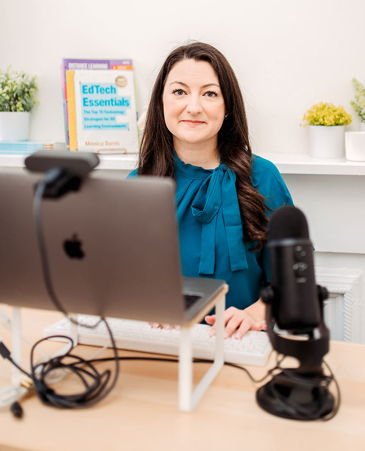 Monica Burns - EdTech Speaker & Consultant typing on her computer